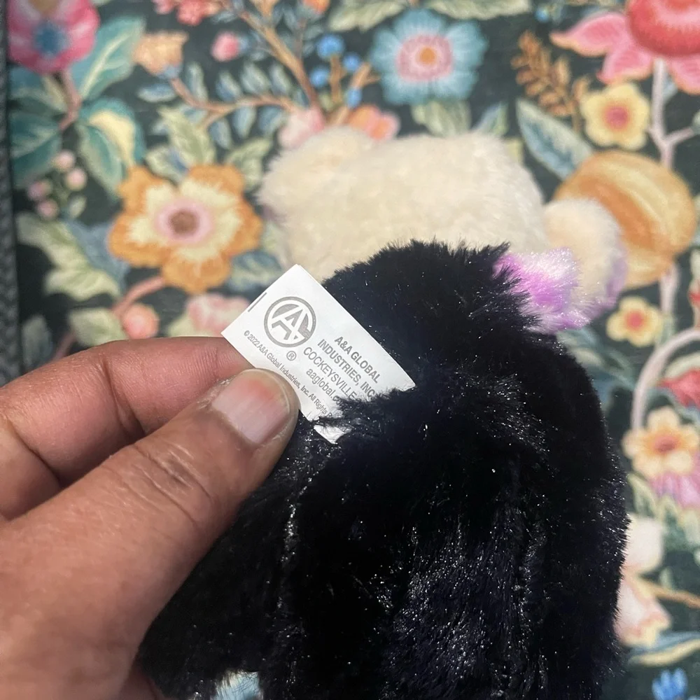 Charming Plush Panda Toy with Purple and Black Details